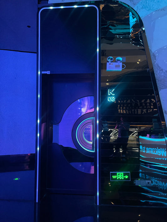 Modern soundproof door with circular design and soft LED glow, showcasing eco-friendly and sustainable architecture in a KTV or club setting
