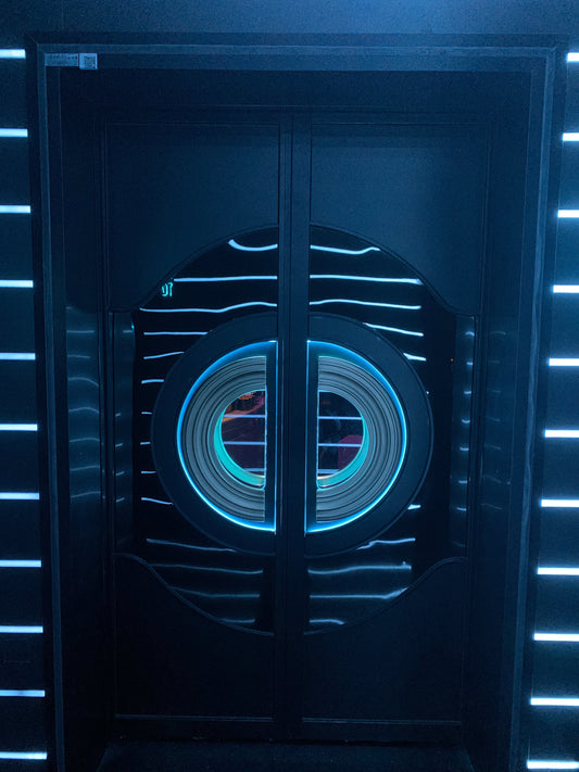 Stylish double soundproof door with circular LED lighting, ideal for apartment use to reduce noise and enhance fire safety.
