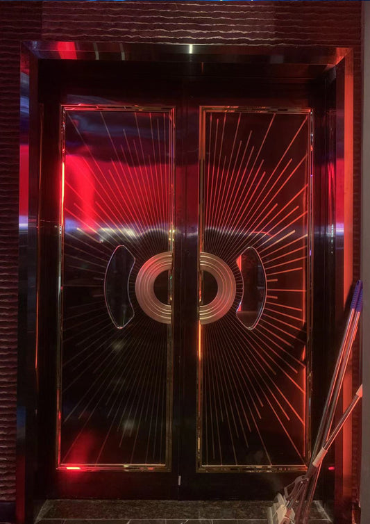 Luxury double-leaf soundproof fire door with metallic detailing and radial LED reflection, perfect for upscale entertainment spaces