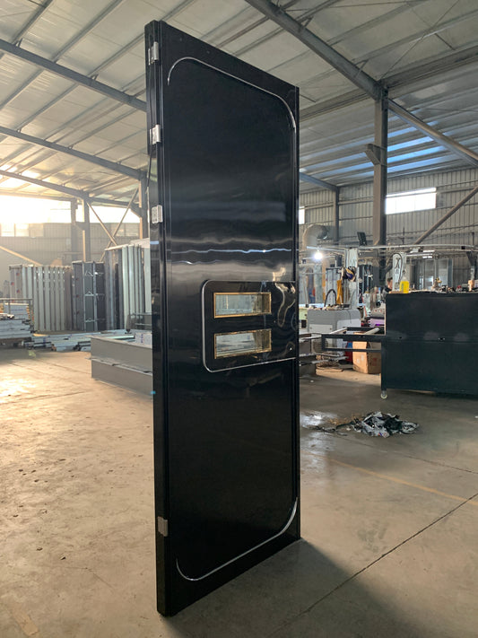 Pre-installed black acoustic door with hardware hinges and window, fully assembled for quick renovation installation
