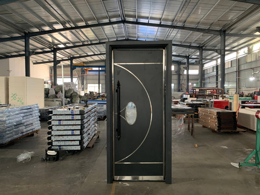 UL and BS certified fire-rated acoustic door photographed inside factory, ready for shipment with stacked units in the background