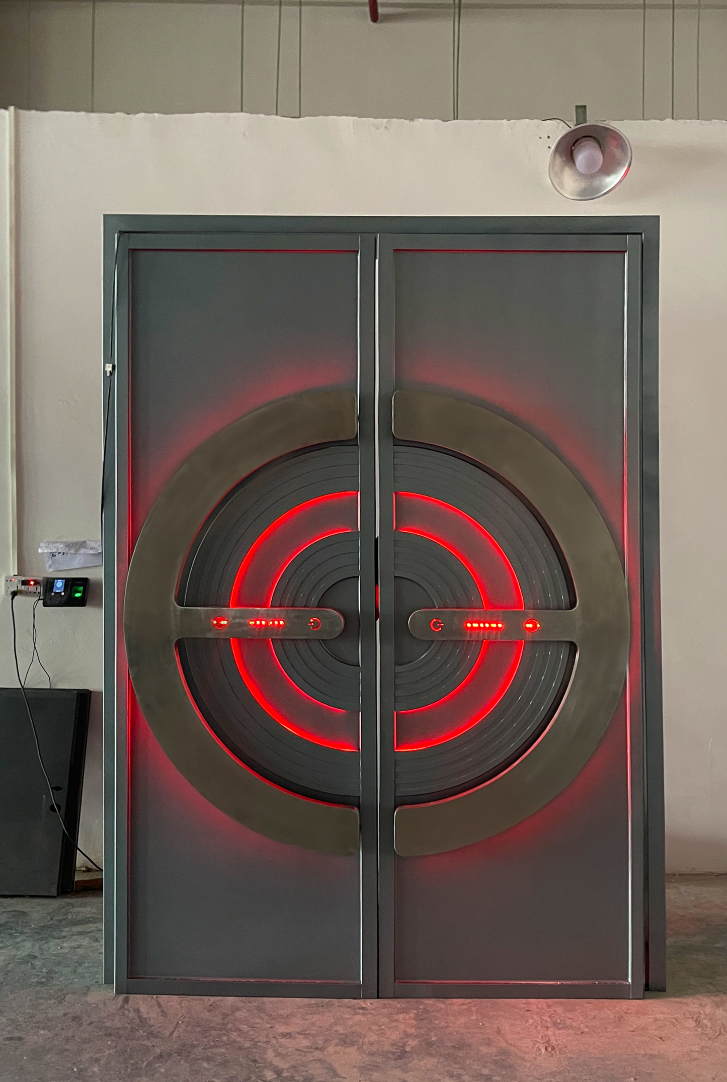 Double soundproof door with concentric red LED rings and metallic circle design – perfect for futuristic KTV or club entrances